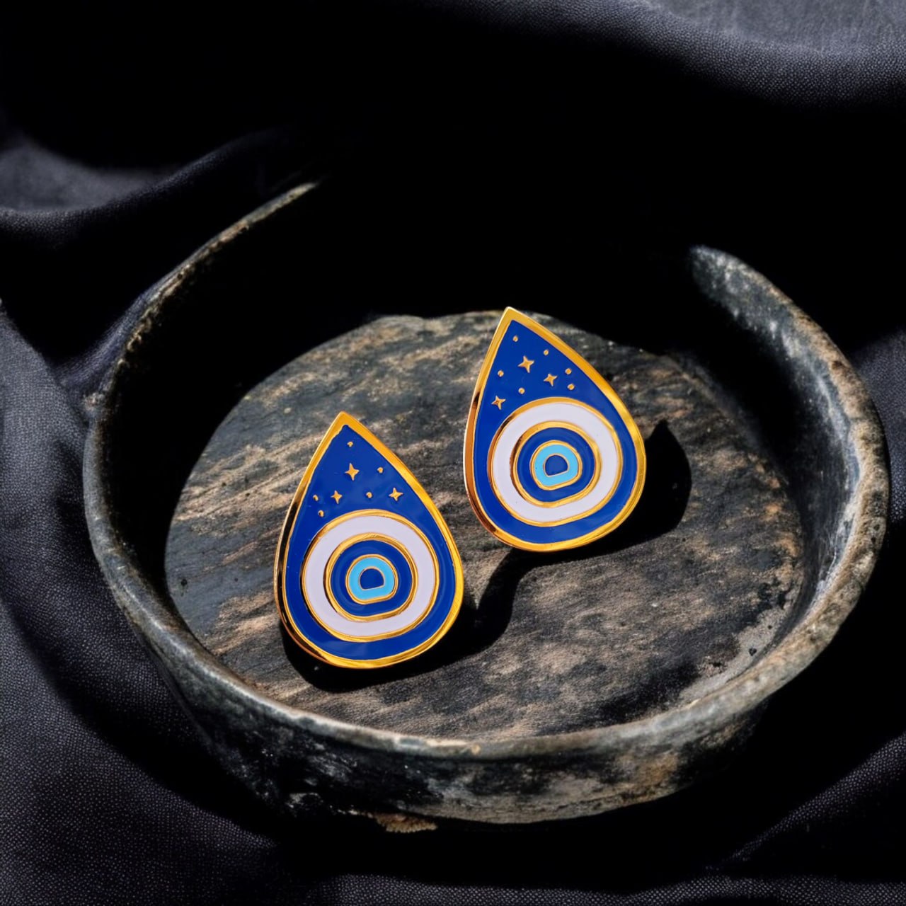 Tear eye earrings