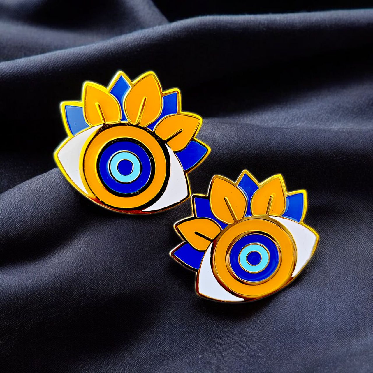 Colored eye earrings
